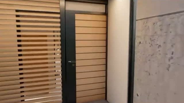 Interior visualization of a wood slat partition and modern entry door